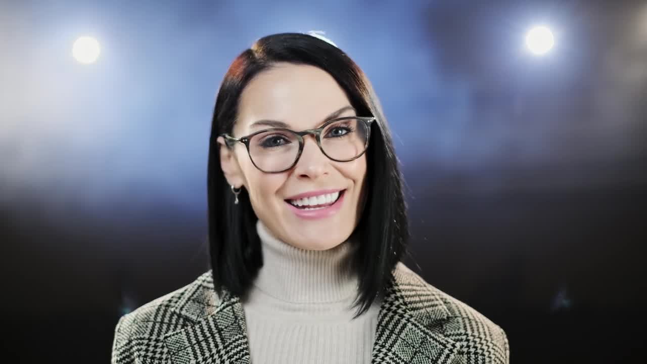 Download Video Stock Portrait Of A Female Speaker Talking On A Stage Live Wallpaper Free