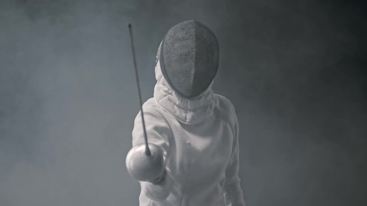 Download Video Stock Portrait Of A Fencer Who Waves His Sword Live Wallpaper Free