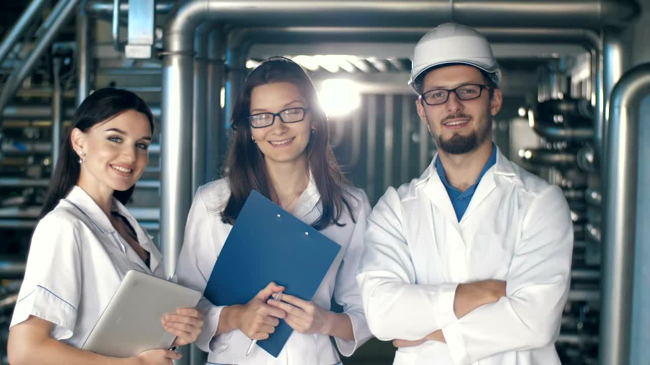 Download Video Stock Portrait Of Engineers In Factory Live Wallpaper Free