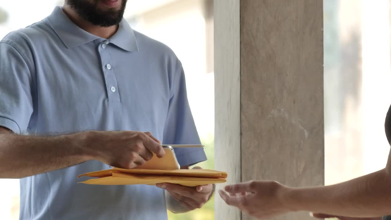 Download Video Stock Postman Delivering Envelopes To A Person At Home Live Wallpaper Free