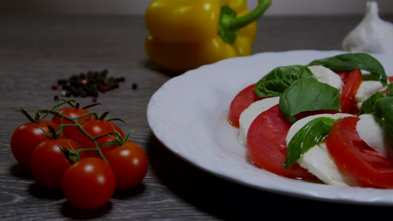 Download Video Stock Pouring Oil Over A Tomato Salad Live Wallpaper Free