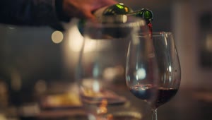 Download Video Stock Pouring Wine In A Couple Of Glasses On A Date Live Wallpaper Free