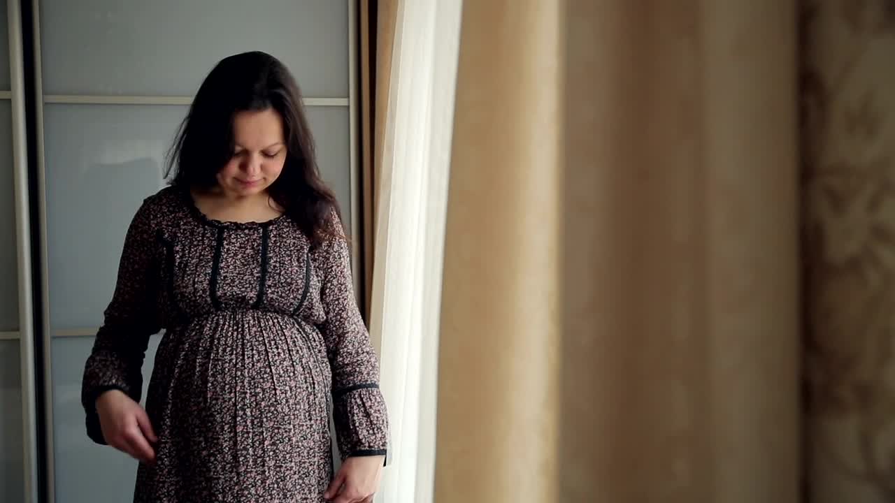 Download Video Stock Pregnant Woman Hugs Her Tummy With Hope Live Wallpaper Free