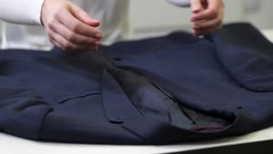 Download Video Stock Preparing A Jacket For Cleaning Live Wallpaper Free