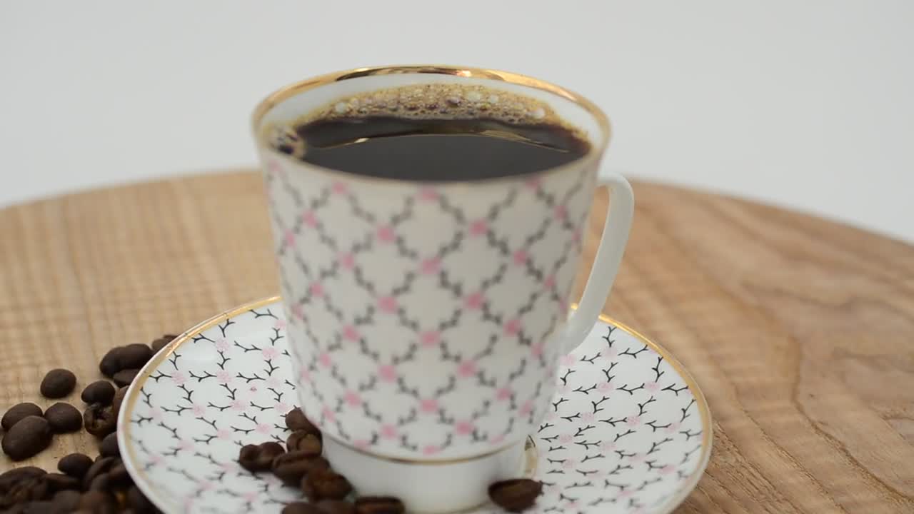 Download Video Stock Presentation Of Coffee In A Cup With Classic Design Live Wallpaper Free