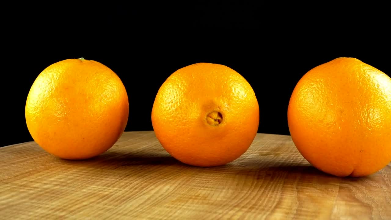 Download Video Stock Presentation Of Oranges Rotating On A Table Live Wallpaper Free