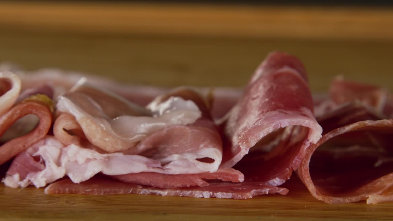 Download Video Stock Prosciutto On A Chopping Board Live Wallpaper Free