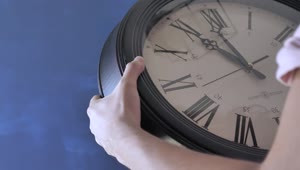 Download Video Stock Putting On A Wall Clock Live Wallpaper Free