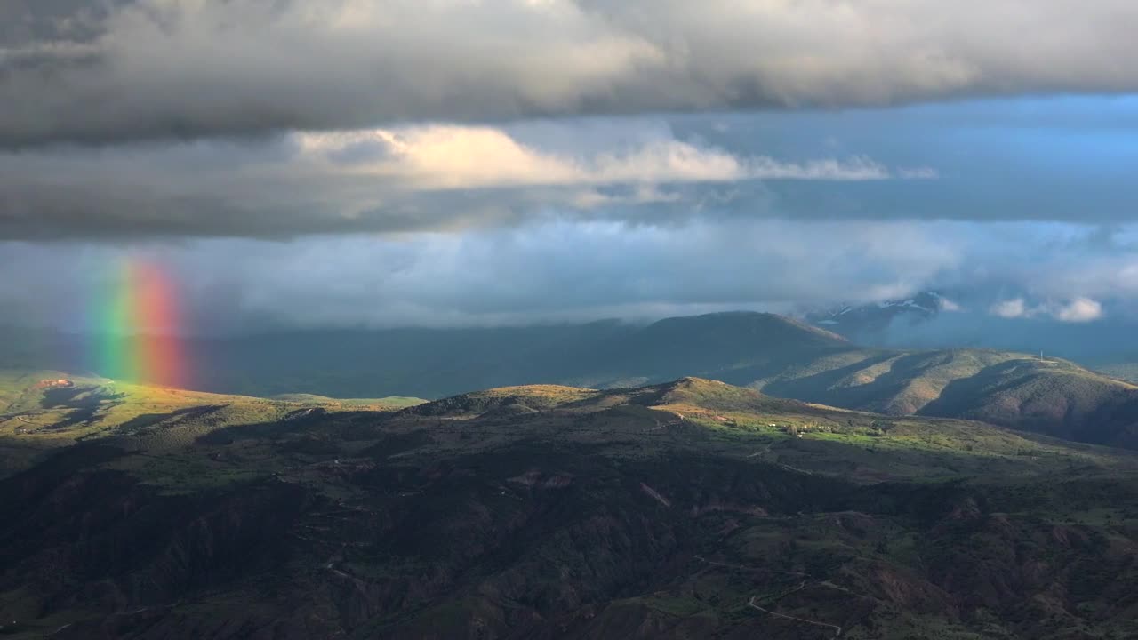 Download Video Stock Rainbow In The Peak Of A Mountain Live Wallpaper Free