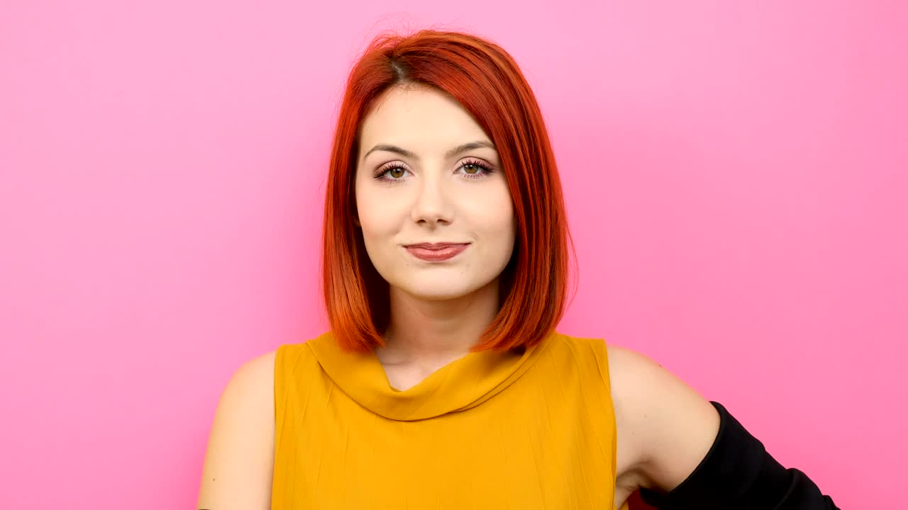 Download Free Stock Video Redhead Woman Smiling With Pink Background Live Wallpaper