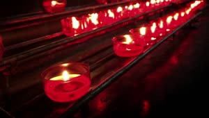 Download Free Stock Video Religious Or Spiritual Place With Series Of Red Candles Live Wallpaper
