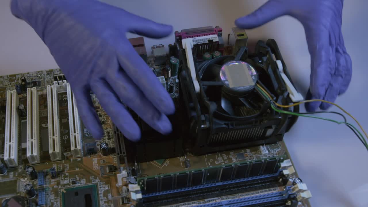 Download Free Stock Video Removing A Cpu From An Old Motherboard Live Wallpaper