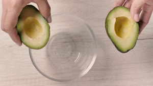 Download Free Stock Video Removing The Peel From An Avocado Live Wallpaper