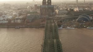 Download Free Stock Video Revealing The Cathedral Near A River Aerial Shot Live Wallpaper