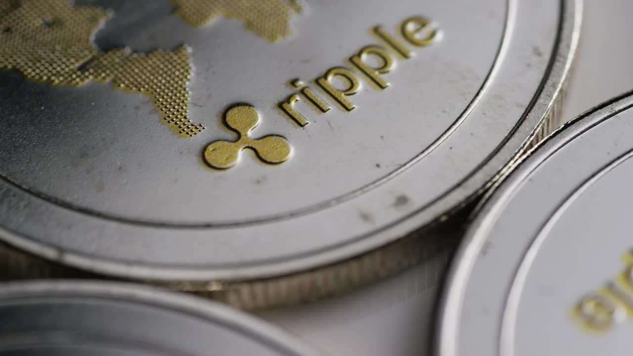 Download Free Stock Video Ripple Bitcoin Coins In A Close Shot Live Wallpaper