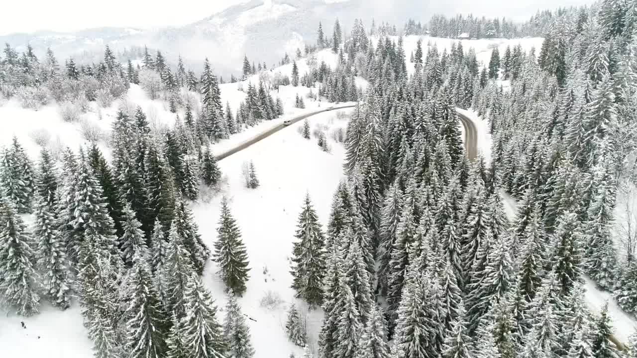 Download Free Stock Video Road In The Snow Covered Alps Live Wallpaper