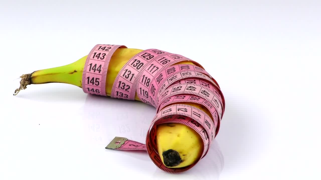 Download Free Stock Video Rolled Banana With Measuring Tape Live Wallpaper