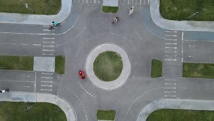 Download Free Stock Video Roundabout In A Road With People On Bikes Live Wallpaper