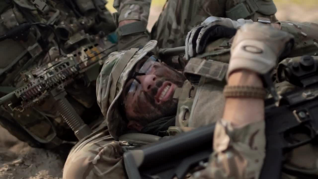 Download Free Stock Video Saving A Wounded Soldier In The Battlefield Live Wallpaper