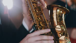 Download Free Stock Video Saxophonist Wearing A Jacket Live Wallpaper