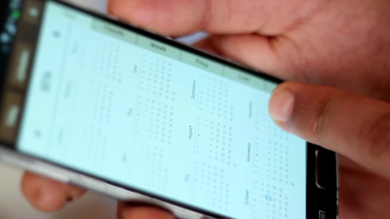 Download Free Stock Video Scheduling An Appointment On A Smartphone Live Wallpaper