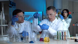 Download Free Stock Video Scientists Compare Chemical Samples Live Wallpaper