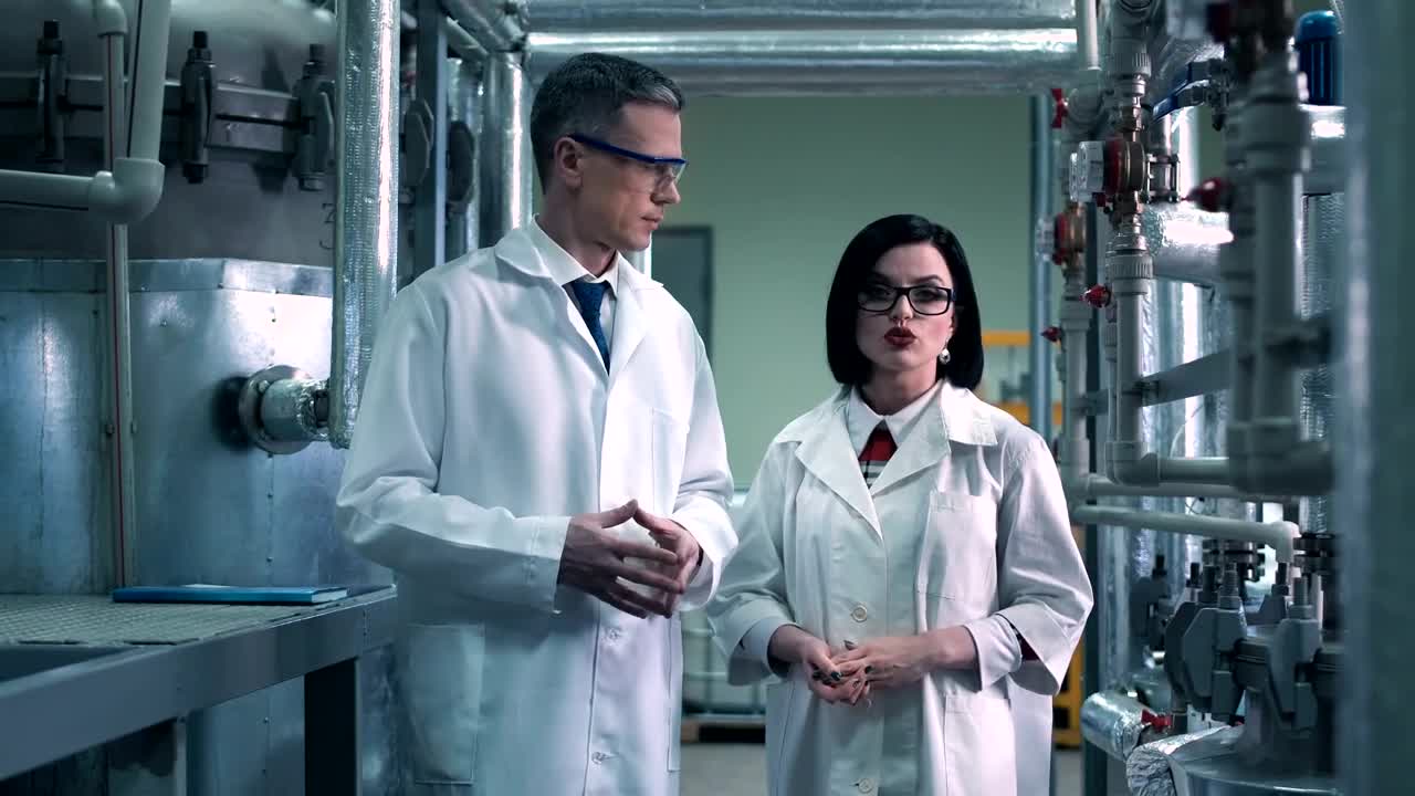 Download Free Stock Video Scientists Talking In The Laboratory Live Wallpaper