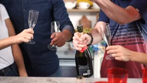 Download Free Stock Video Serving Champagne At A Birthday Party Live Wallpaper