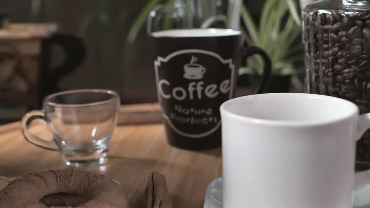 Download Free Stock Video Serving Coffee Directly From A Coffee Pot Live Wallpaper