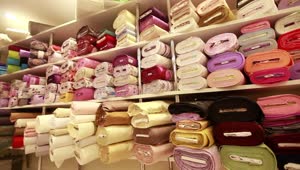 Download Free Stock Video Shelf Full Of Fabric Rolls In A Store Live Wallpaper