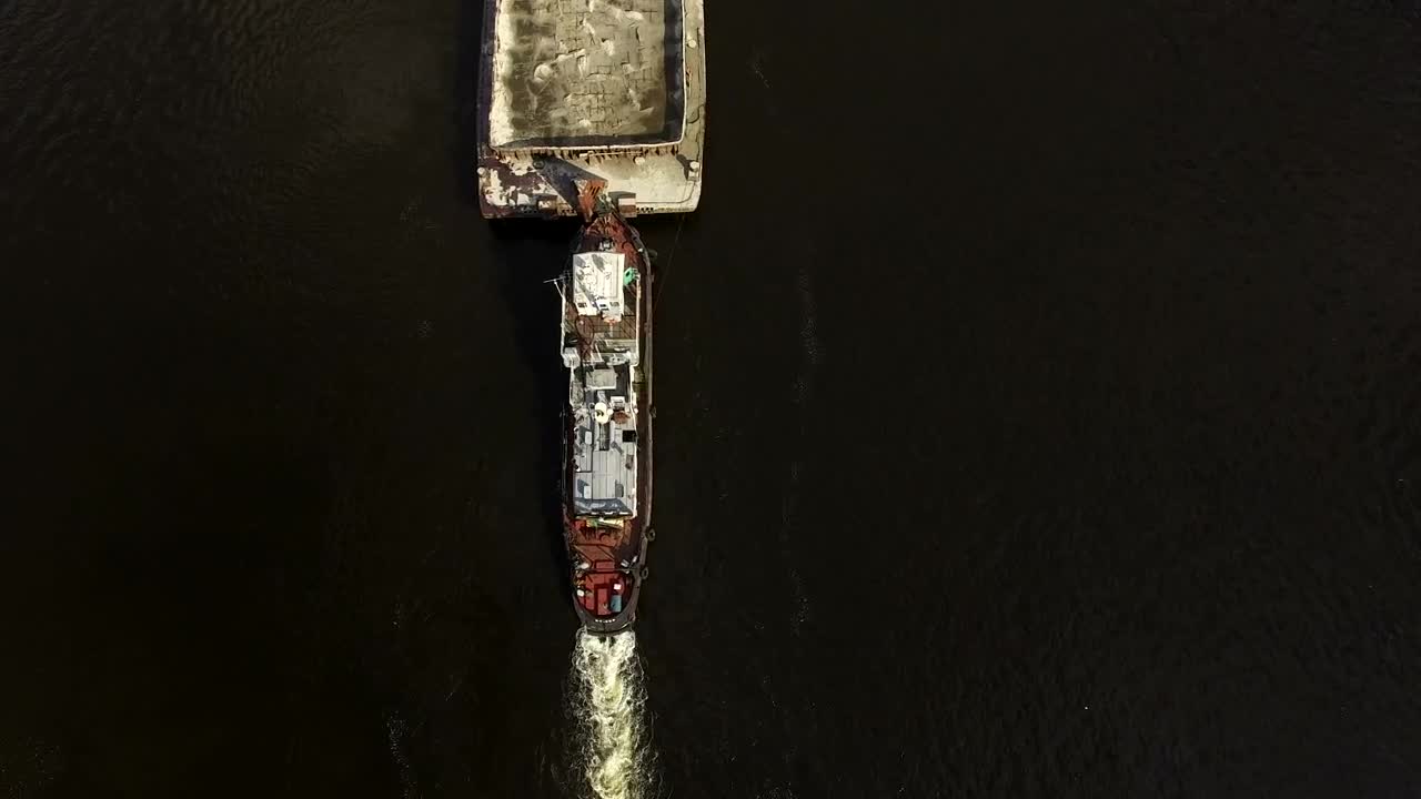 Download Free Stock Video Ship Pushing A Cargo Ship Aerial View Live Wallpaper