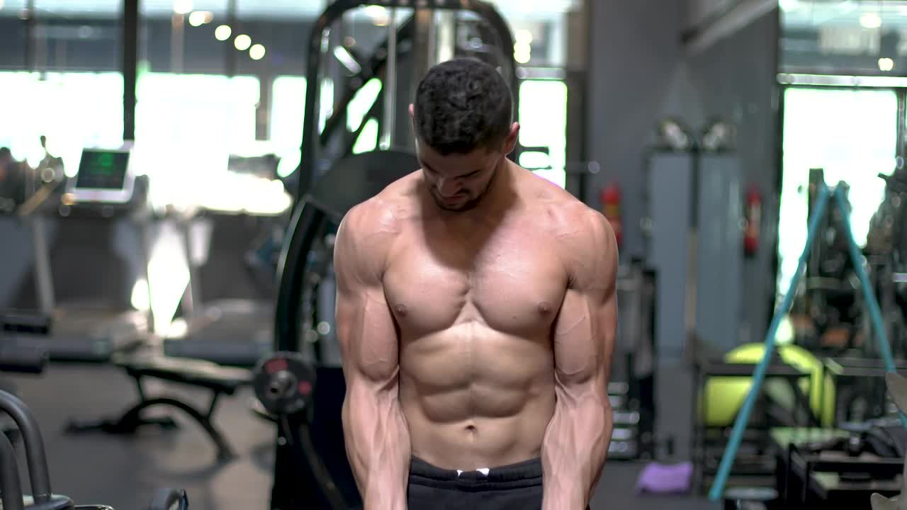 Download Free Stock Video Shirtless Bodybuilder Training In The Gym Live Wallpaper