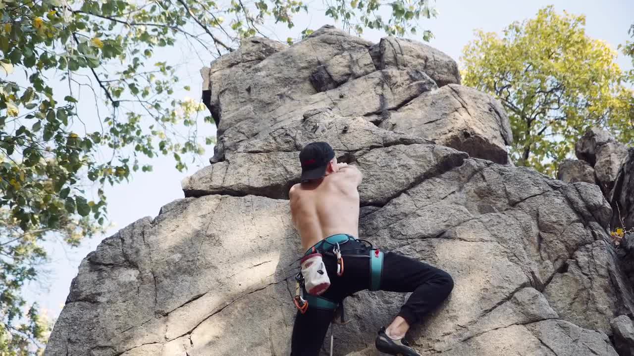 Download Free Stock Video Shirtless Man Climbing A Rock Live Wallpaper