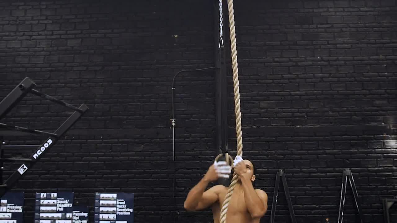 Download Free Stock Video Shirtless Man Rope Climbing At The Gym Live Wallpaper