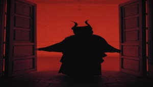 Download Free Stock Video Silhouette Of A Person With Horns And Robe Under A Live Wallpaper