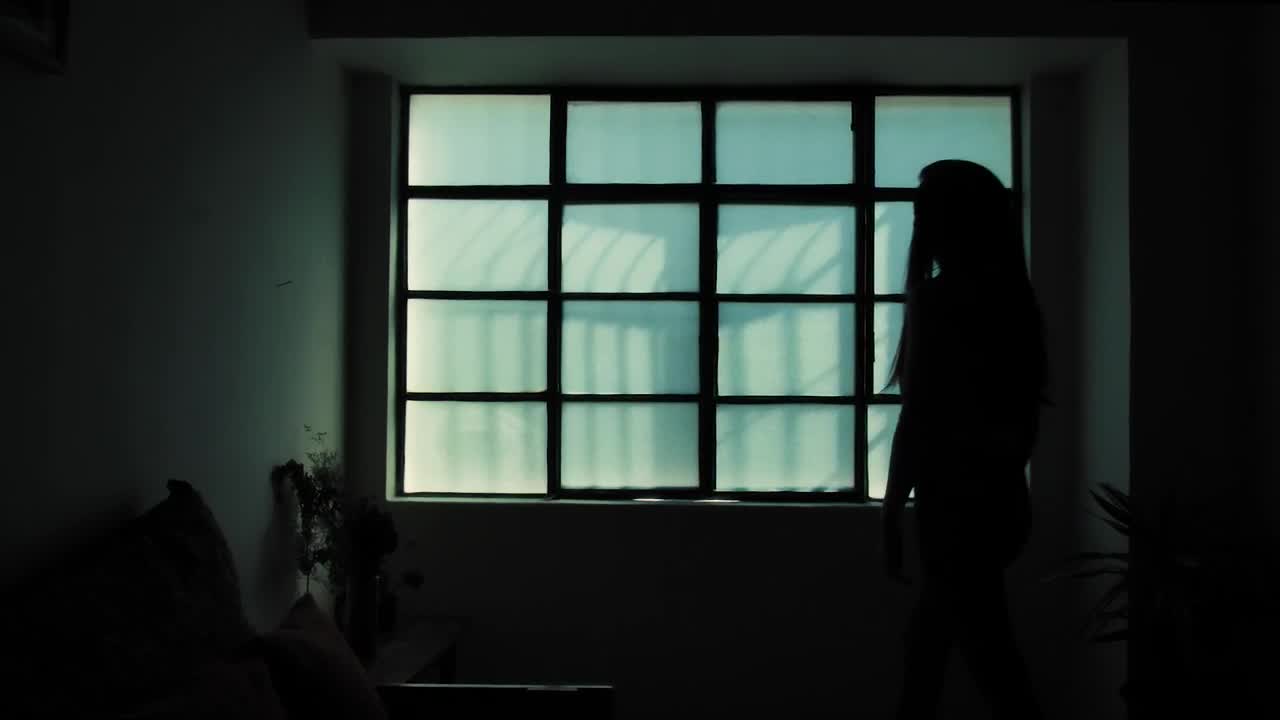 Download Free Stock Video Silhouette Of Woman Opening A Window Live Wallpaper