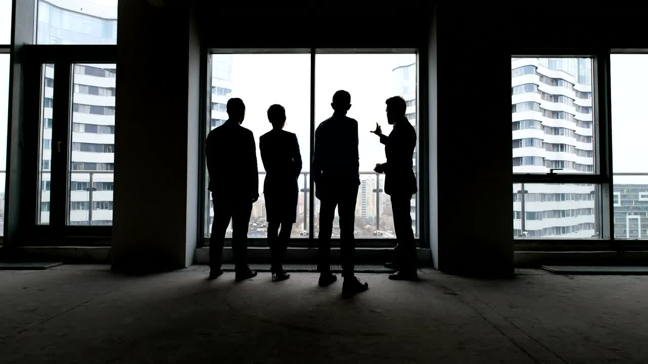 Download Free Stock Video Silhouettes Of A Business Meeting Live Wallpaper