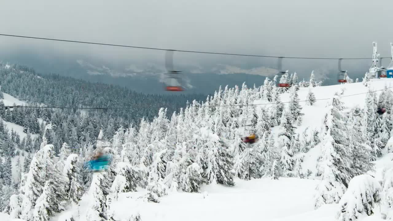 Download Free Video Stock Ski Lift Over A Frozen Mountain Forest Live Wallpaper