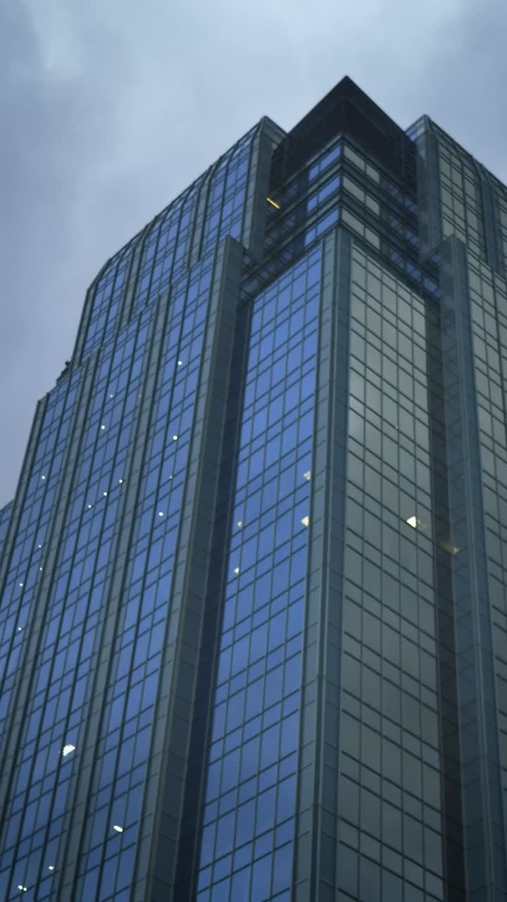 Download Free Video Stock Skyscraper In The City Seen When Walking The Street Live Wallpaper