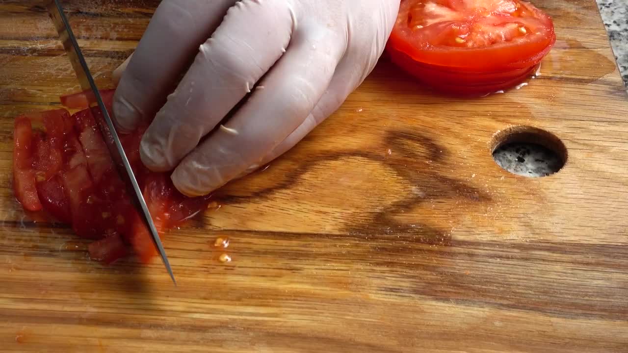 Download Free Video Stock Slicing Tomato On A Board Live Wallpaper