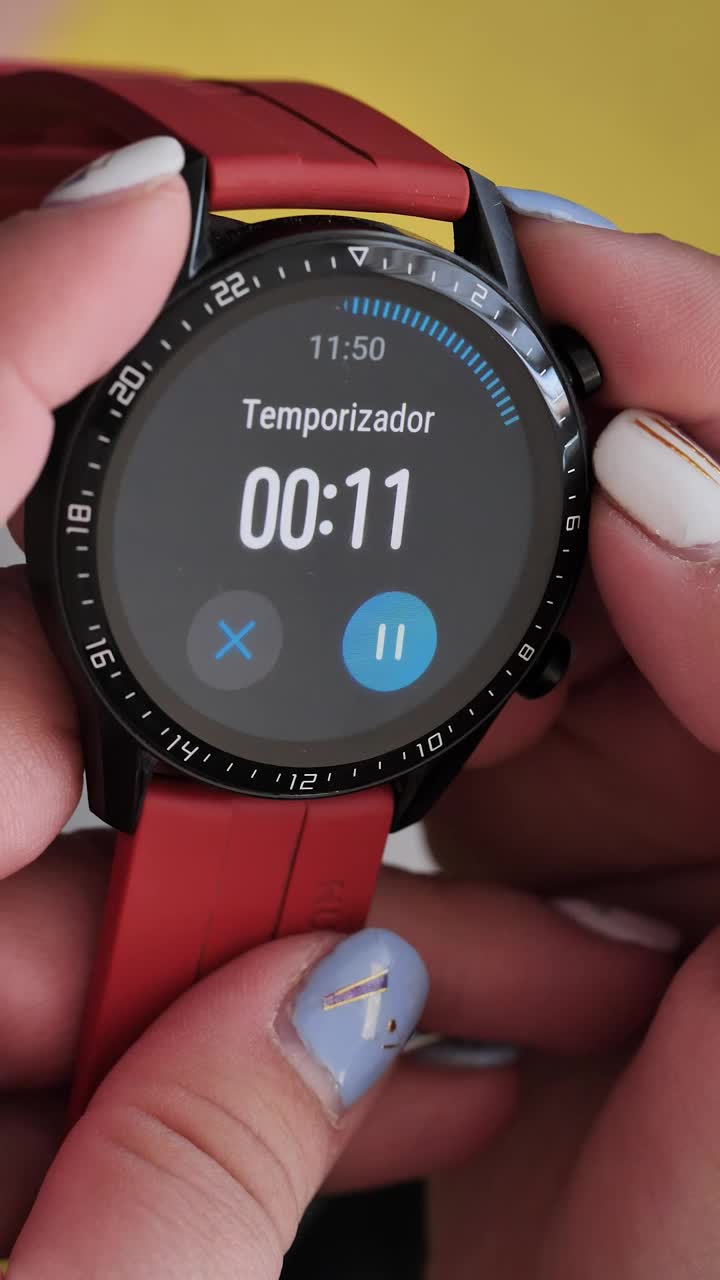 Download Free Video Stock Smart Watch With Timer Held By A Woman Live Wallpaper