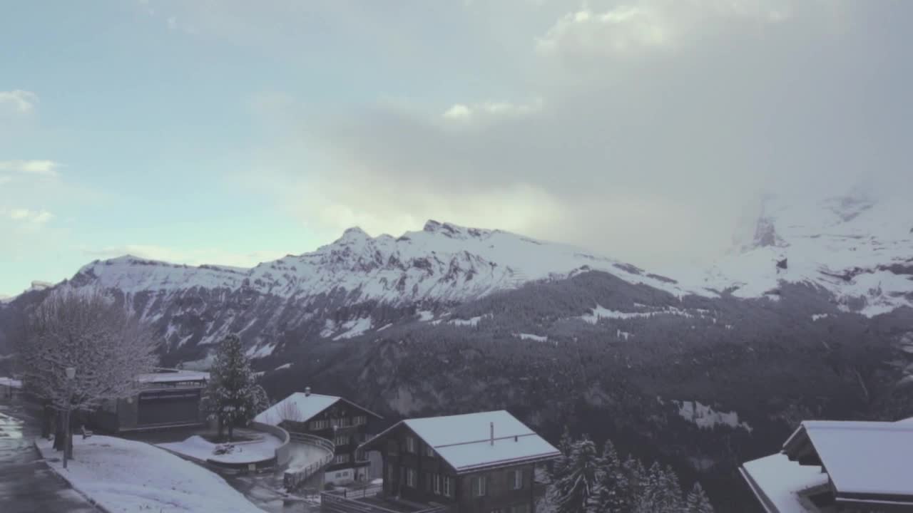 Download Free Video Stock Snow Capped Mountains And A Small Town Live Wallpaper