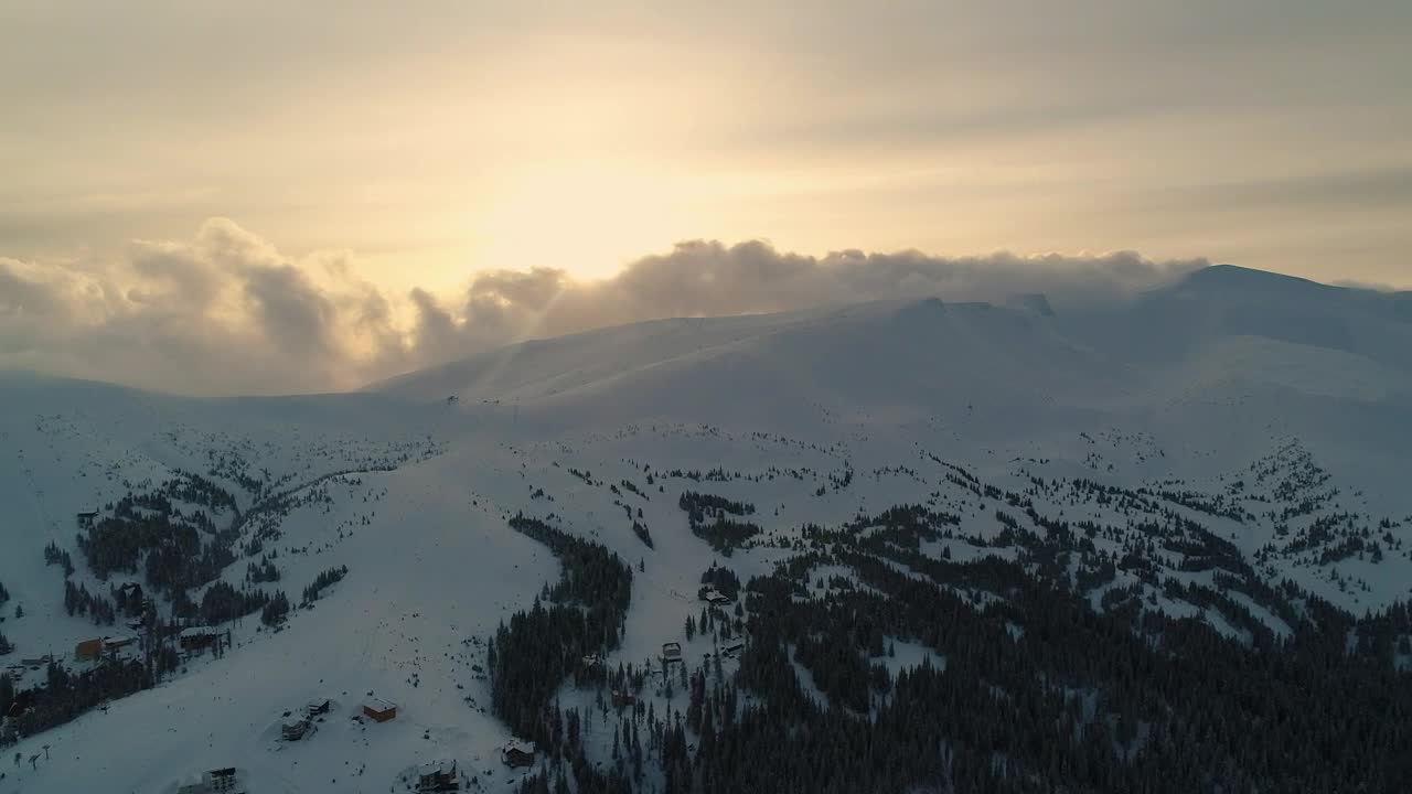 Download Free Video Stock Snowy Mountain With Pine Trees And Mist Overhead Live Wallpaper