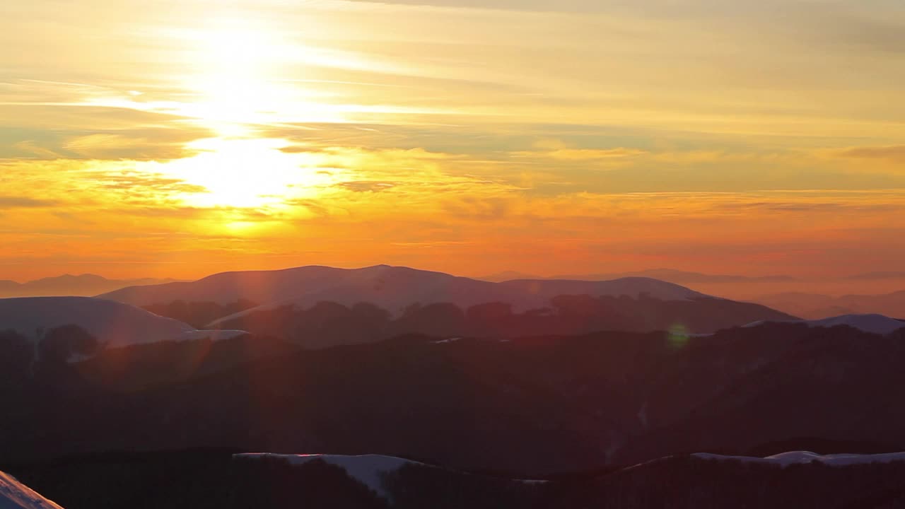 Download Free Video Stock Snowy Mountains Landscape During Sunset Pan Shot Live Wallpaper