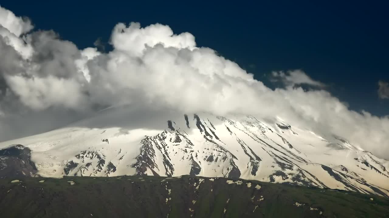 Download Free Video Stock Snowy Peak With Clouds Live Wallpaper