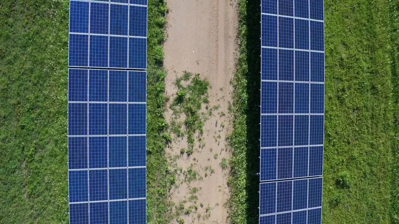 Download Free Video Stock Solar Panels In A Field Live Wallpaper