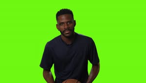 Download Free Video Stock Sportsman With A Basketball On A Green Background Live Wallpaper