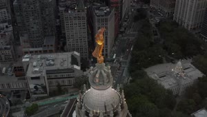 Download Free Video Stock Statue On Top Of A Building In New York City Live Wallpaper