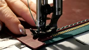 Download Free Video Stock Stitching A Wallet Using A Sewing Machine Live Wallpaper