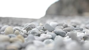 Download Free Video Stock Stones Covering A Beach Live Wallpaper